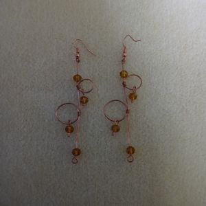 Copper and citrine colored glass Loop De Loop earrings